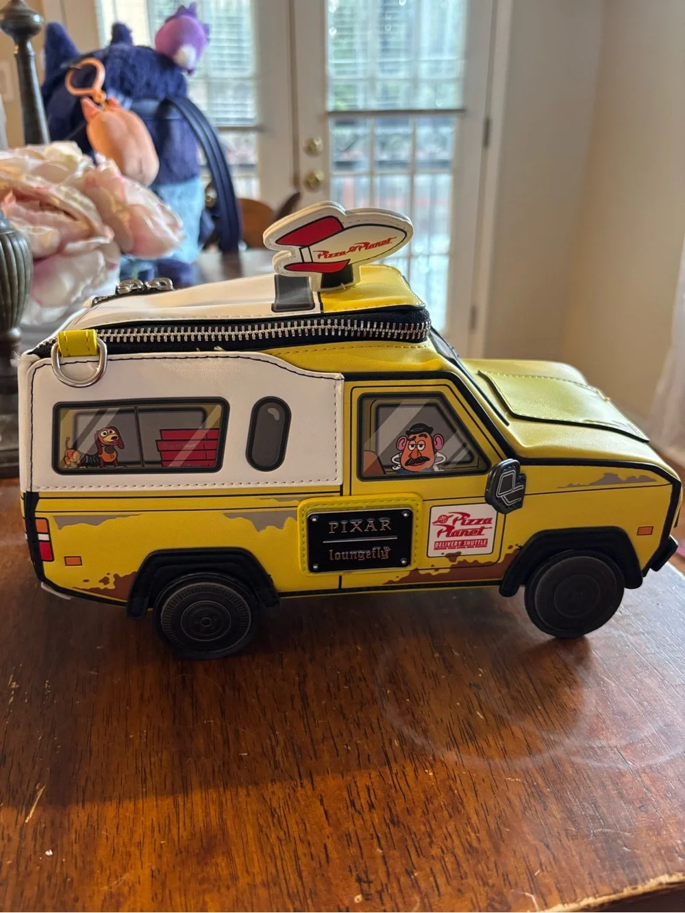 Loungefly Pixar Pizza Planet Van Purse in Yellow, White & Black